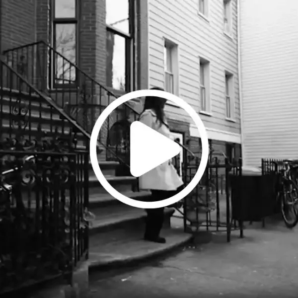 Lady walking down steps